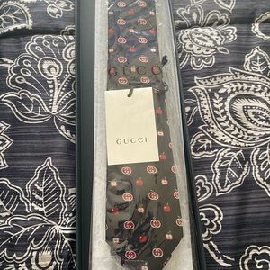 Brand new Gucci tie. Never worn. Comes with box.
